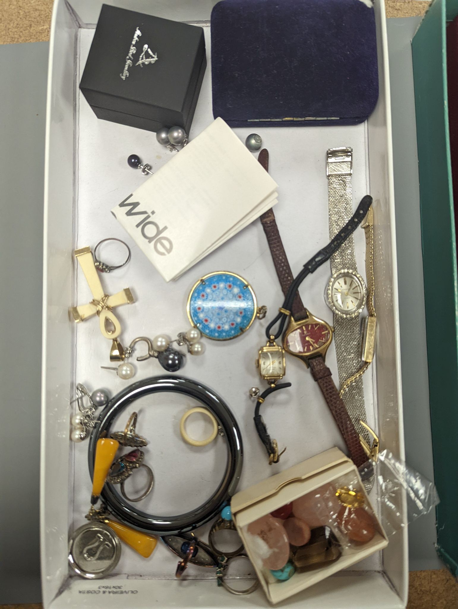 A quantity of assorted collectables including costume jewellery, watches, unmounted cut semi-precious gemstone and assorted pens, etc.